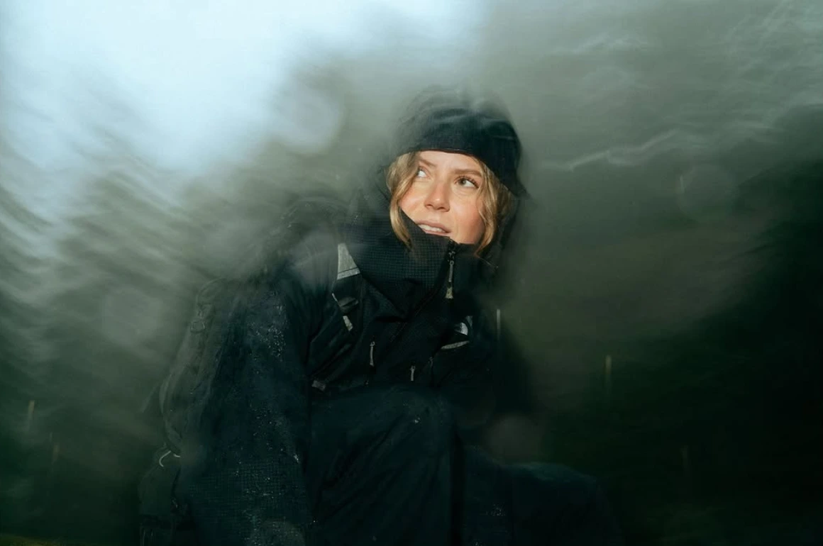 Portrait seen through soft motion blur and glassy distortion.